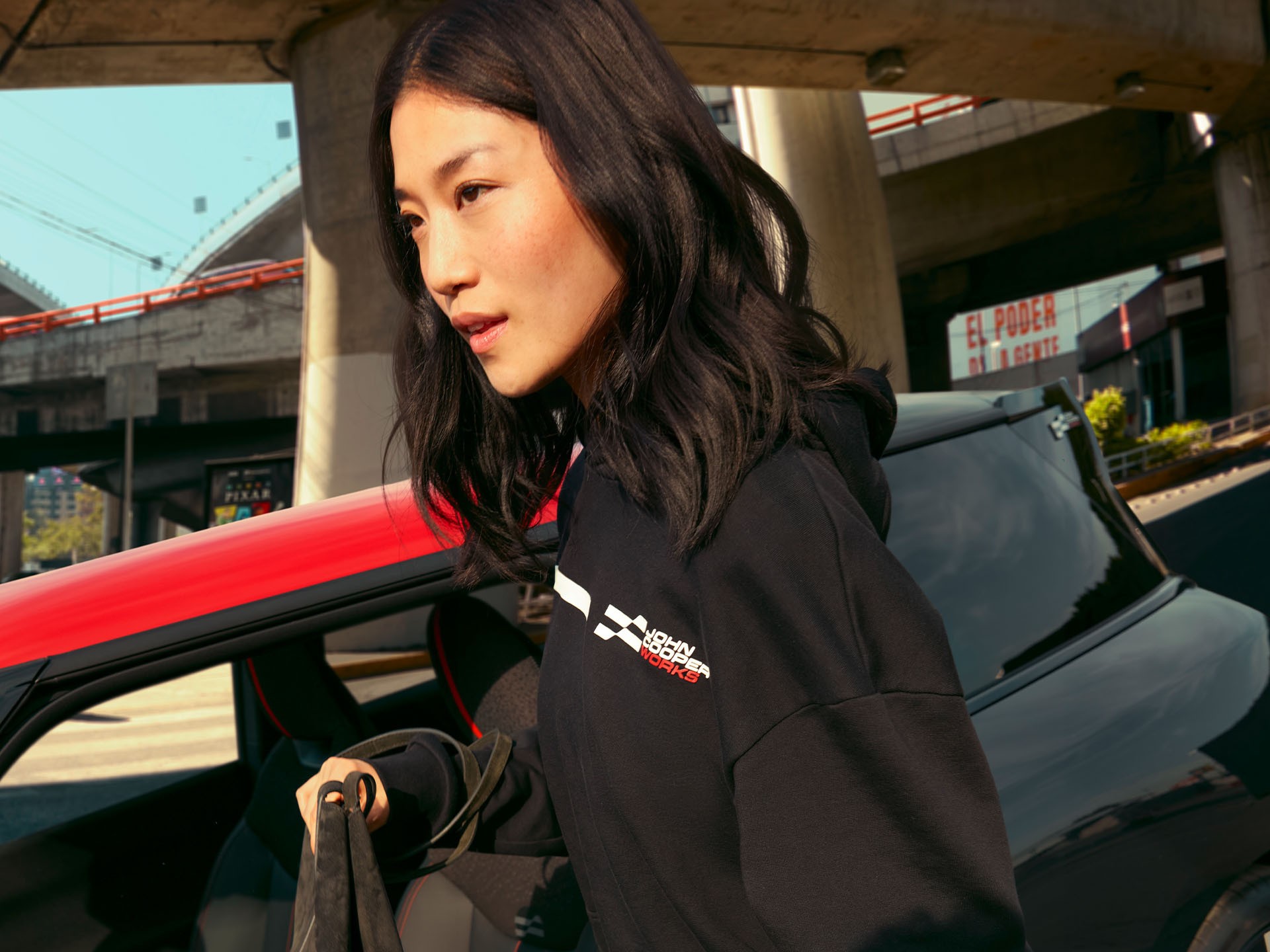 One model wearing hoodie of the new MINI Lifestyle Collection 2025.